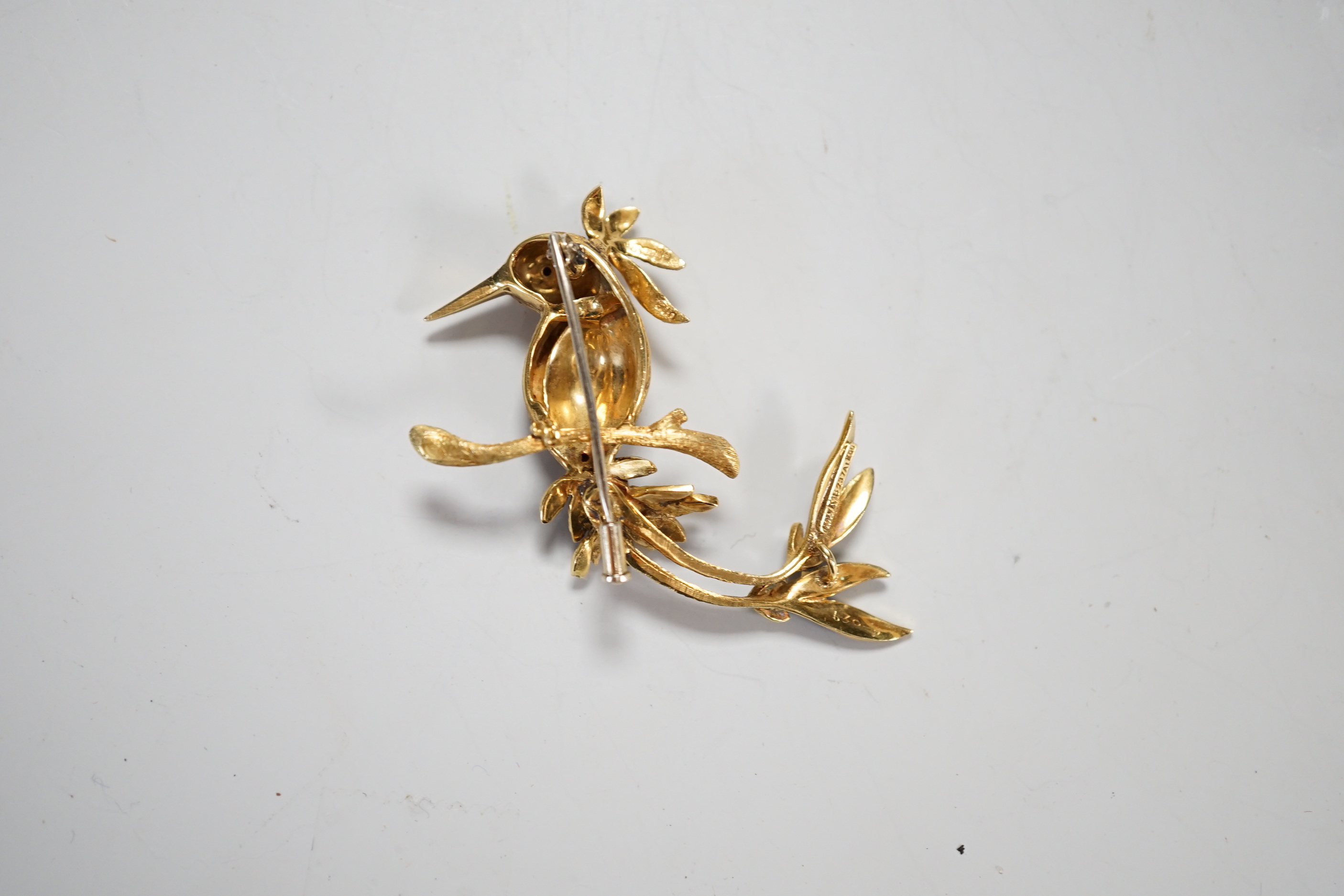 A 1960's Italian 18ct gold and polychrome enamel set exotic bird brooch, with gem set eye, 47mm, gross weight 15.7 grams.